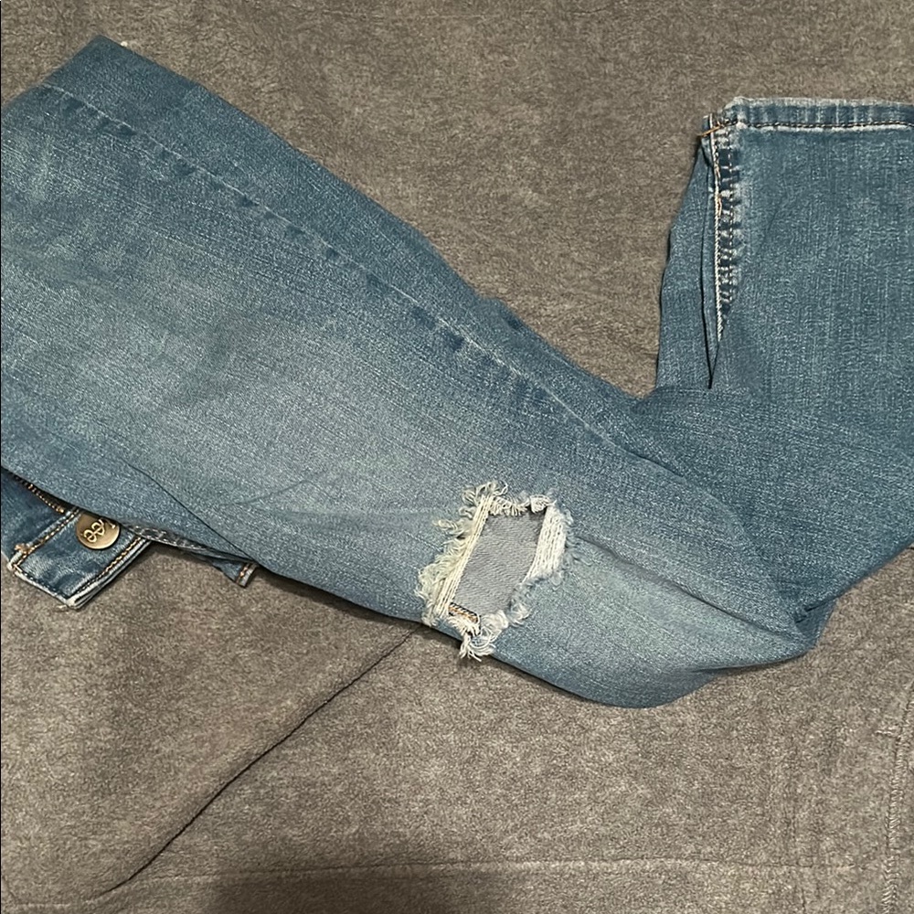 Distressed Blue Denim Jeans